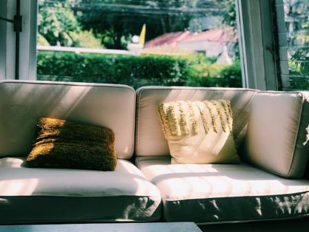 Top 8 Things to Consider Before Placing Your Couch in Front of a Window